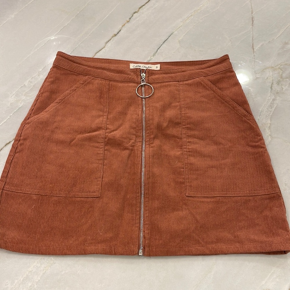 Super cute Corduroy mini skirt, size M, brand new without the tags.